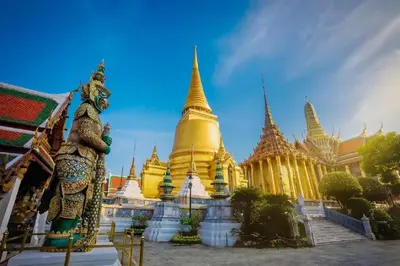 a temple with a building with many spires on it at XX GO INN Khaosan - The Grand Palace ตรอกข้าวสาร in Bangkok