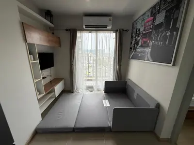 a small living room with a couch and a window at Cozy Living in Bangkok 60m to MRT near chatuchank in Bang Su