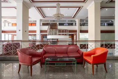 a lobby with a couch and two chairs at PETRA Designer Apartment Sukhumvit, Nana BTS in Bangkok