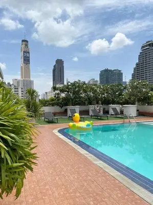 a large swimming pool with a inflatable at Apartment studio at platinum in Bangkok