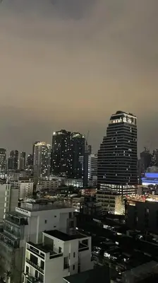 a view of a city with a tall building at Apartment studio at platinum in Bangkok