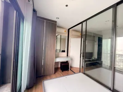 a room with glass walls and a desk in it at the Tree Rio Bang-Aor in Bang O
