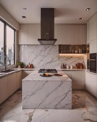 a kitchen with a large marble island in the middle at Dream appartment in Bangkok