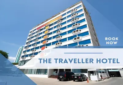 a hotel with a sign that reads the traveller hotel at Palette The Travellers Hotel Bangkok in Bangkok