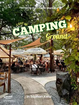 a magazine cover of a camping ground with people sitting at tables at The Quarter Saphankhwai by UHG in Bangkok