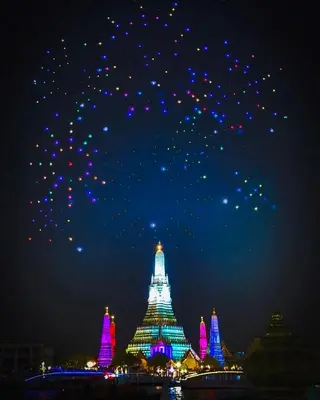 a night view of a lit up temple at night at The Central Bangkok Station1 in Bangkok