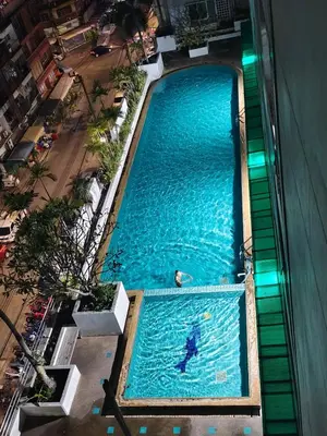 an overhead view of a swimming pool in a building at The Central Bangkok Station1 in Bangkok