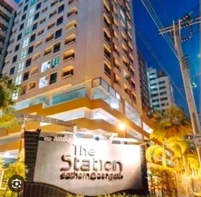 a large building with a sign in front of it at The Central Bangkok Station1 in Bangkok