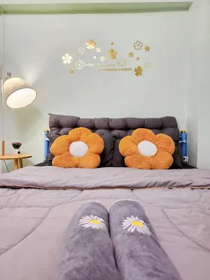 a bedroom with a bed with two stuffed animals on it at 703-STP Homely room Free Wi-Fi and Near BTS line in Bangkok