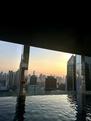 a view of the city from the top of a building at Condo Luxe Siam Pool 360 Near BTS Shopping in Bangkok