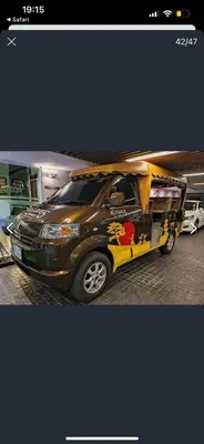 a large truck parked in a parking lot at Apartment in Central Sukhumvit in Bangkok