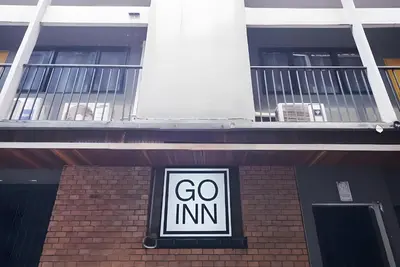 a go inn sign on the side of a building at XX GO INN BTS Silom - Saint Louis สถานีรถไฟฟ้าเซนต์หลุยส์ in Bangkok