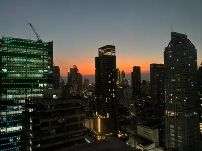 a view of a city skyline at sunset at SkyVillas Residential Apartments in Yan Nawa