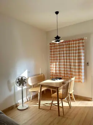 a dining room with a table and chairs at J House in Nonthaburi