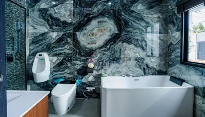 a bathroom with a toilet and a sink and a tub at Bangkok Luxury Private Pool & Jacuzzi Villa , Daily Maid in Bang Bua Thong