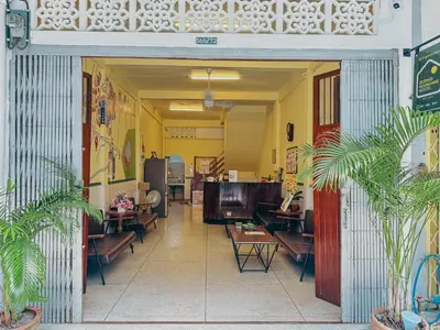 a lobby of a restaurant with chairs and tables at During Moonshine Stay in Bangkok