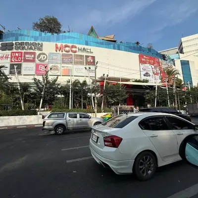 a white car parked in a parking lot in front of a building at 2BR - MRT Lak Song 5 Minute - Garden-Gym-Pool-wifi in Ban Khlong Khwang Klang