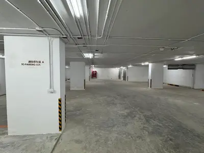 an empty room with white walls and ceilings in a building at Wanda Jin Residences The Ease Sierra Bangkok in Bangkok