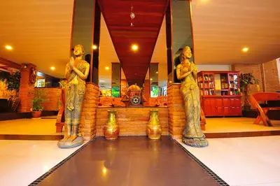 two statues of women standing in a room at Sathorn View in Bangkok