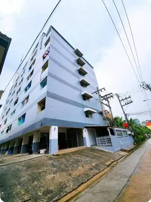 a white building with balconies on the side of it at 201-STP Homely room Free Wi-Fi and Near BTS in Sathani Bang Khen