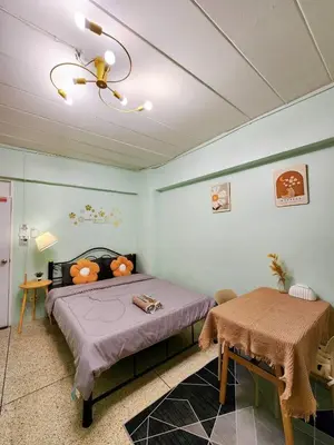 a bedroom with a bed and a table in it at 201-STP Homely room Free Wi-Fi and Near BTS in Sathani Bang Khen