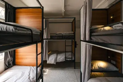 a group of bunk beds in a dorm room at nap in a blue moon in Bangkok