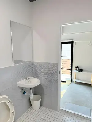 a white bathroom with a sink and a toilet at xx Yellow Place Sukhumvit Soi 2 -เยลโล เพลส สุขุมวิทซอย 2 in Bangkok