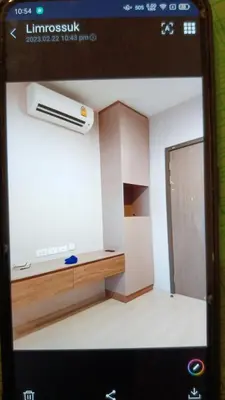 a picture of a room with a television and a room with aitures at IDEO Wat Thaphra Bangkok Yai in Bangkok