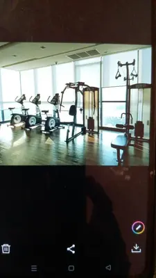 a gym with several exercise bikes in a building at IDEO Wat Thaphra Bangkok Yai in Bangkok