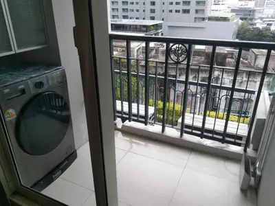 a view of a balcony with a washing machine at Modern Place Watthana, Thonglor BTS, Sukhumvit in Bangkok