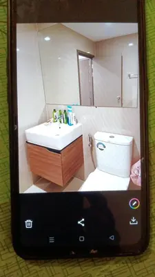 a bathroom with a sink and a toilet and a mirror at Cyber carer NSW in Bangkok Yai