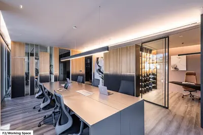 an office with a long table with chairs and a desk at Luxury Home Office Srinakarin in Lat Krabang