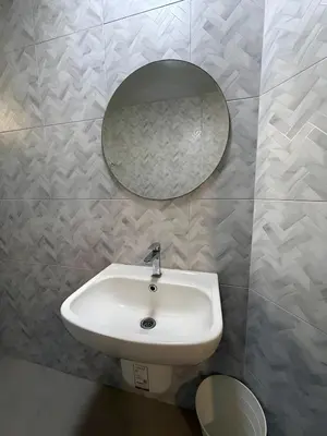 a bathroom with a sink and a mirror on the wall at xx Yellow Place Sukhumvit 2 - BTS Nana Pro in Bangkok