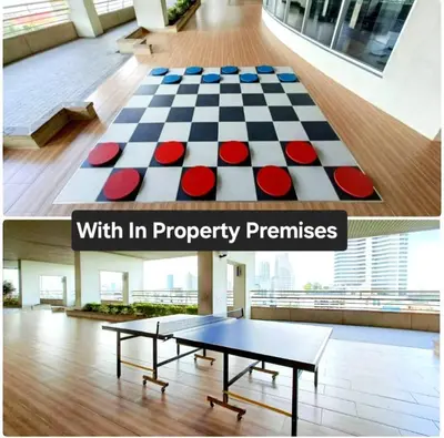 a chess board on a floor in a room at River View 03 in Bangkok