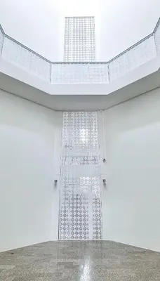 a white room with a large window in the ceiling at Baan Khun Pra No 1 Bangkok Duplex in Bangkok
