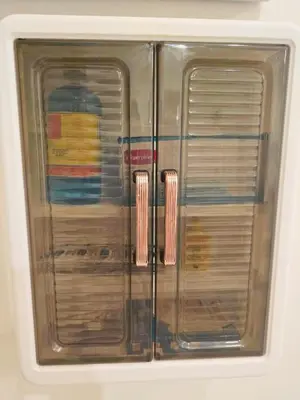a reflection of a glass refrigerator with dishes on it at Bangrak house 200 meters near BTS SaphanTaksin in city in Chinatown