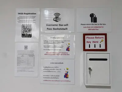 a exhibit of a refrigerator with signs on it at xx BAO The Giant Swing - Sao Chingcha - เบา ศาลเจ้าพ่อเสือ เสาชิงช้า in Bangkok