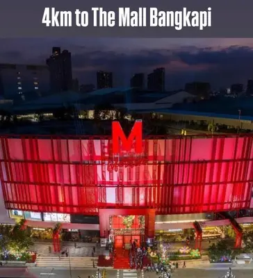 a stadium with a red sign on the side of it at Inspire place rama9 Modern Condo near Rajamangala Stadium Pool and Gym in Bangkok