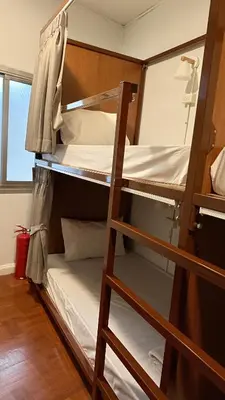 a couple of bunk beds in a room at Delight Hostel at Khao San in Bangkok