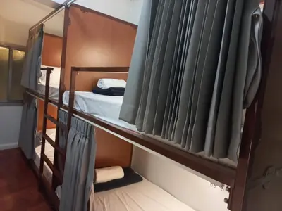 a couple of bunk beds in a room at Delight Hostel at Khao San in Bangkok