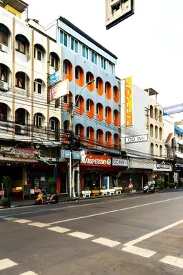 an empty street in a city with buildings at XX GO INN Khaosan - ตรอกข้าวสาร กรุงเทพ in Bangkok