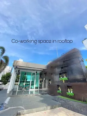 a building with the words go working space in robotics at CozyroomSukumvit13walktoBTS,MRT in Bangkok