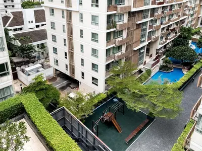 an overhead view of an apartment building with a pool at Exclusive Urban Apt 1BR - Ultra Fast Wifi - Thong Lo in Bangkok