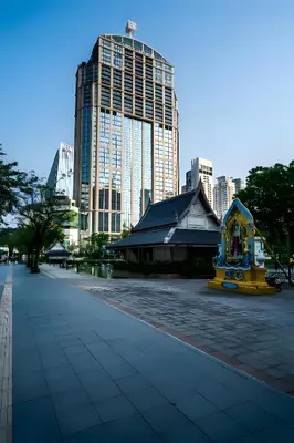 a building in the middle of a city with tall buildings at XX GO INN Sukhumvit Soi 20 - โกอิน สุขุมวิท 20 BTS อโศก in Bang Kapi