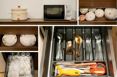 a kitchen drawer with utensils and a microwave at Nivas Wanit 2BR 1SFB Yaowarat MRT EntireHome 80SQM in Bangkok