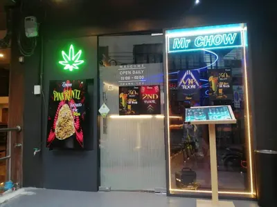 a marijuana dispensary with a sign on the door at Mrchow Nana in Bang Kapi
