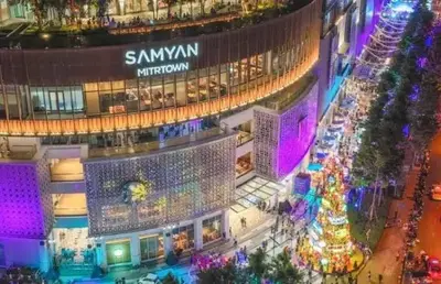 an overhead view of a shopping mall with a christmas tree at New 1-Bedroom Condo for Rent 0 Meters from BTS Wutthakat in Bang Khun Thian