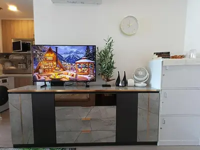 a computer monitor sitting on top of a desk at Luxury condo in Bangkok,NearBTSMochit,MRTChatuchak in Bangkok