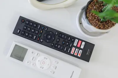 a remote control sitting on top of a counter at A Townhouse 100m from BTS Bangchak in Phra Khanong
