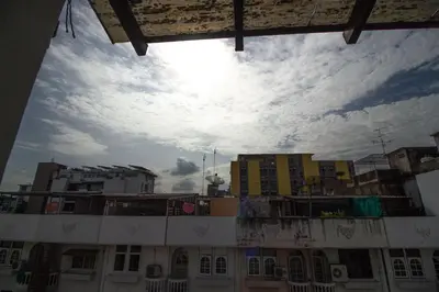 a view of the sky from a building with buildings at Skutan-MTB Sutthisan in Bangkok